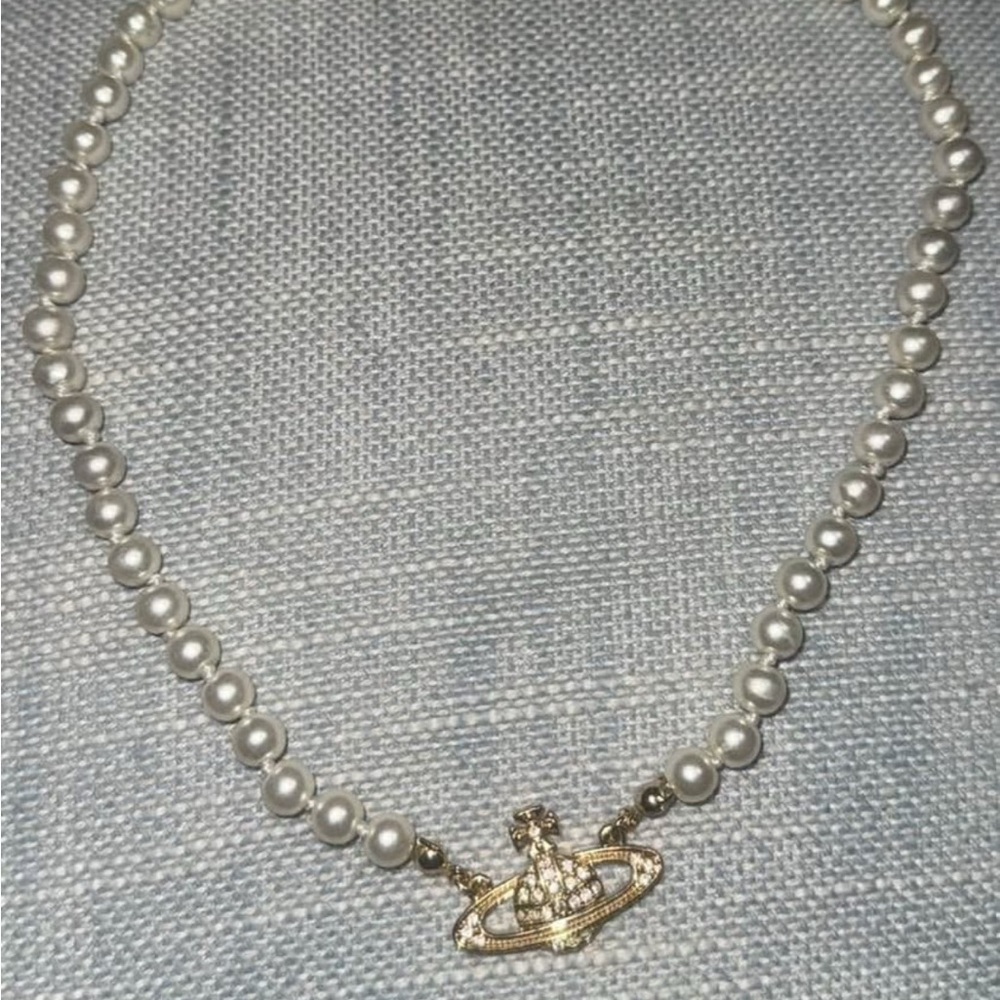Vivienne Westwood White Pearl Necklace with Gold Orb